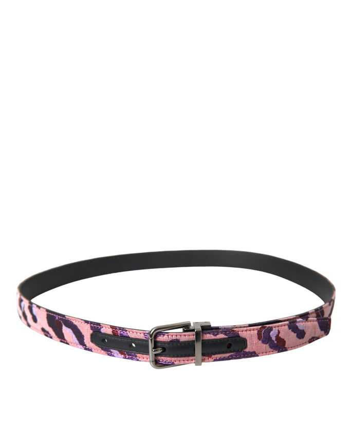 a pink and black leopard print belt with a metal buckle