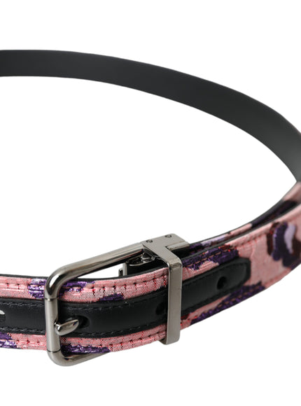 a pink and black dog collar with a metal buckle