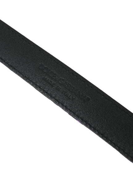 a close up of a black belt on a white background