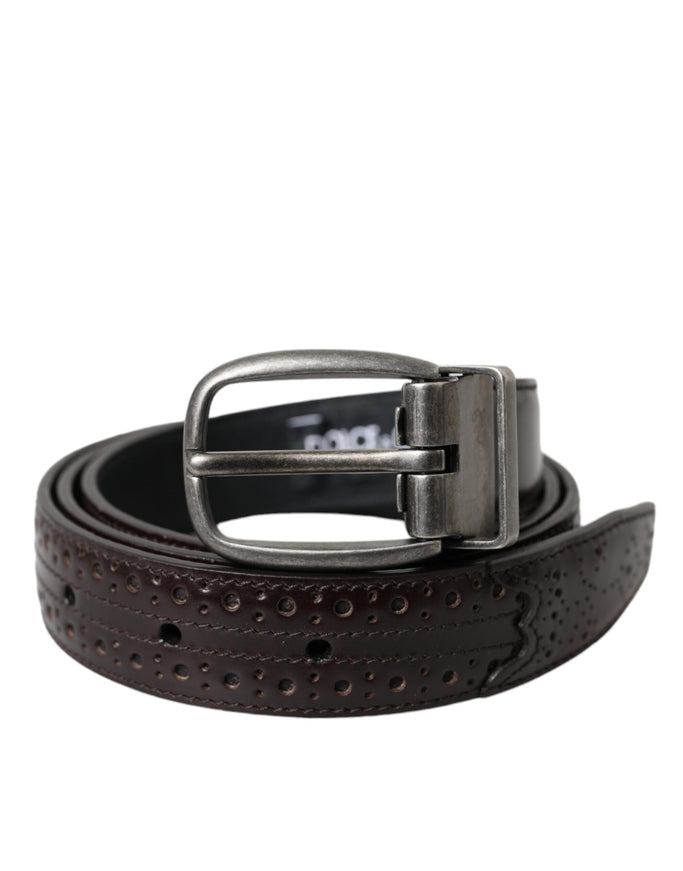 a brown leather belt with a metal buckle