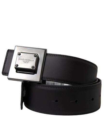 a black leather belt with a metal buckle