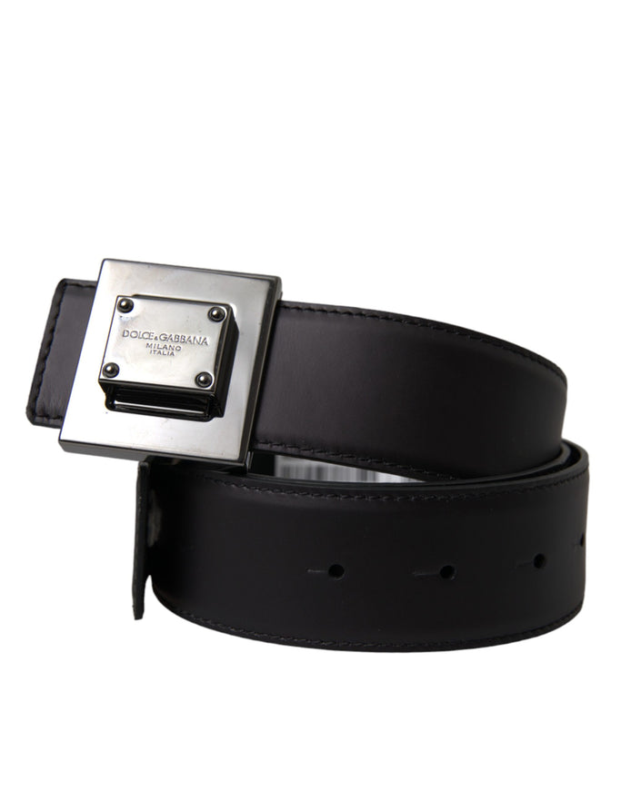 a black leather belt with a metal buckle