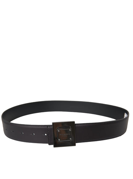 a black leather belt with a square buckle