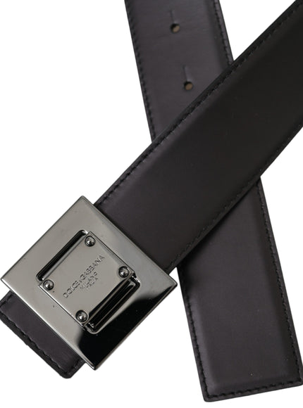 a black leather belt with a metal buckle