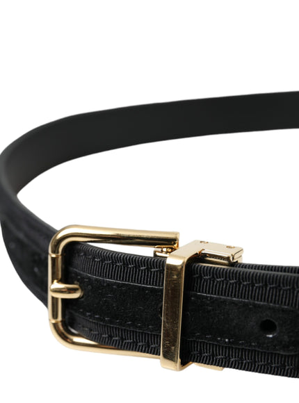 a black belt with a gold buckle on it