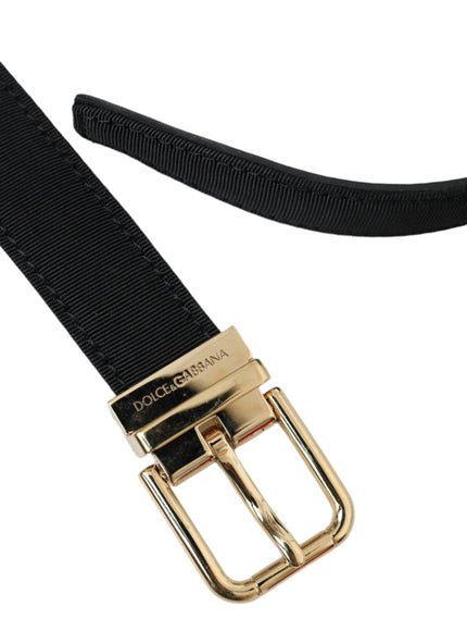 a black belt with a gold buckle