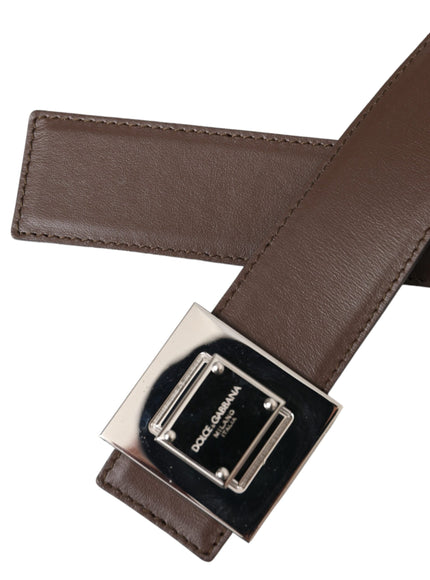 a brown belt with a metal buckle