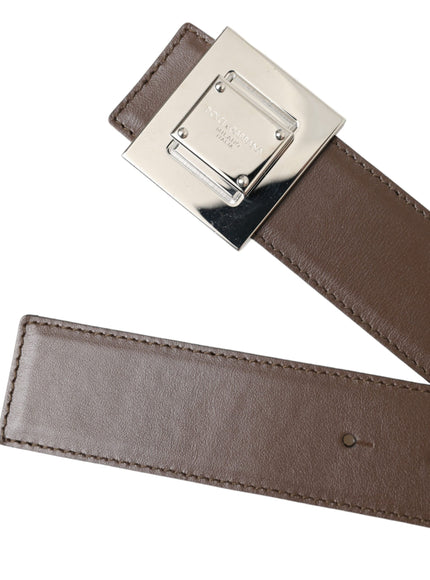 a belt with a metal buckle on a white background