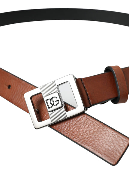 a brown belt with a metal buckle on it