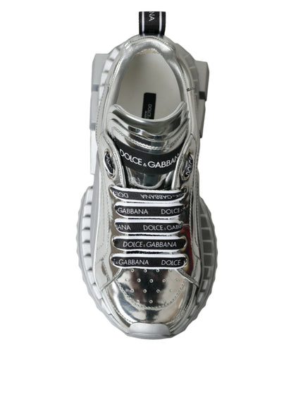 a silver shoe that has a bunch of words on it