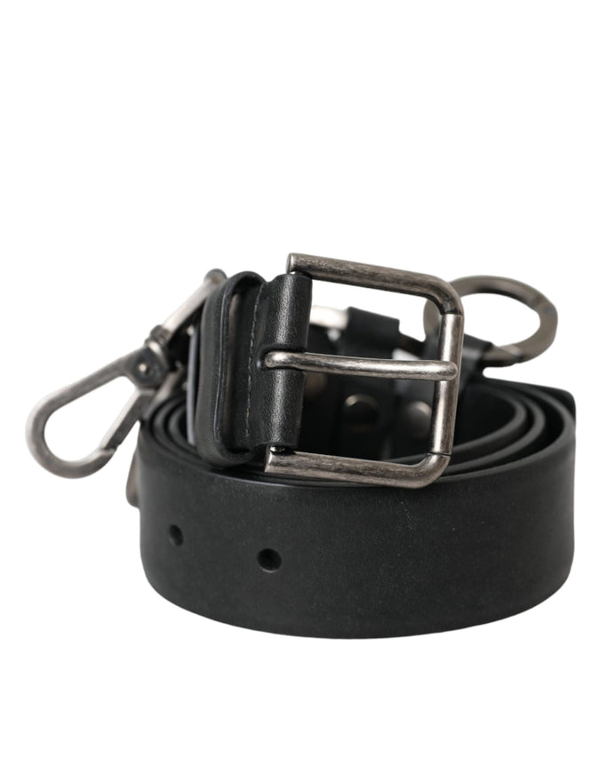 a black leather belt with a metal buckle