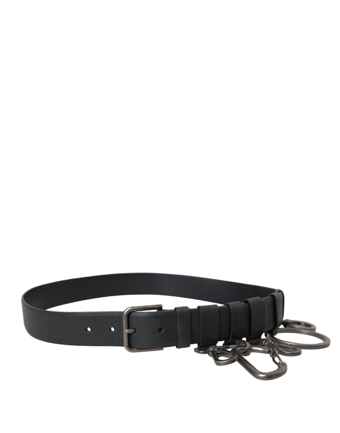 a black belt with metal buckles on a white background