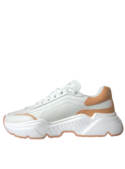 a women's white and orange sneaker