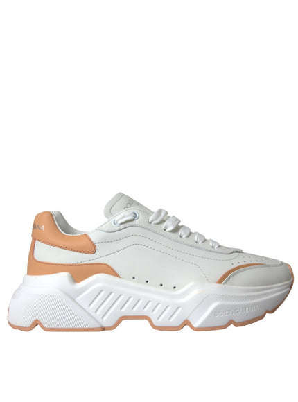 a women's white and orange sneaker