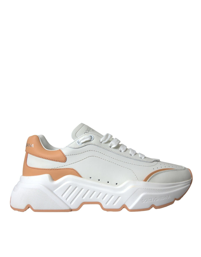 a women's white and orange sneaker