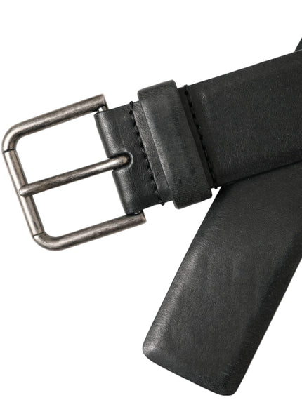 a black leather belt with a metal buckle