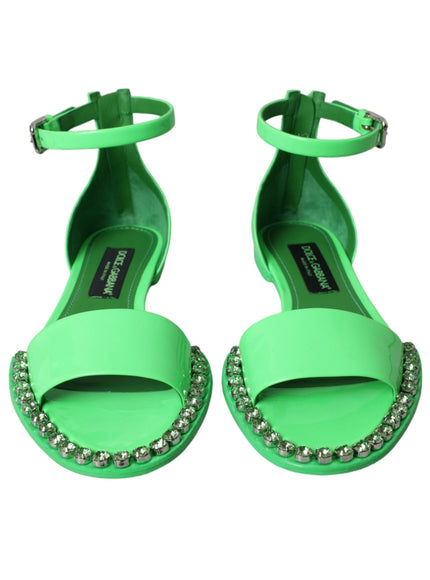 a pair of green high heeled sandals