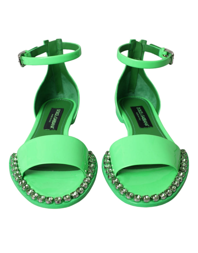 a pair of green high heeled sandals