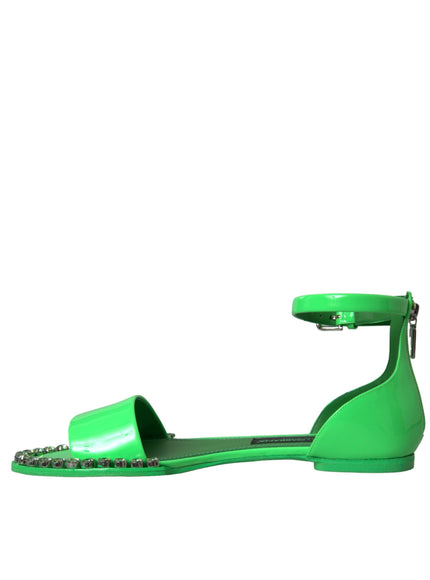 a pair of green shoes on a white background