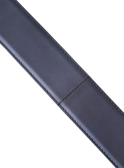 a close up of a black belt on a white background