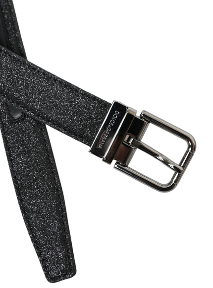 a black belt with a metal buckle