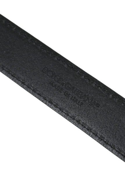 a close up of a black belt on a white background