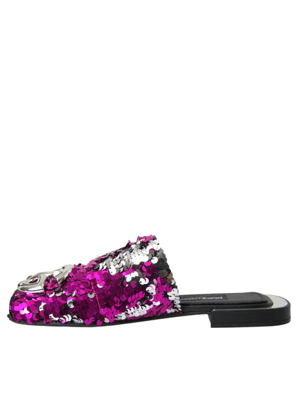 a pair of pink and silver sequinized slippers