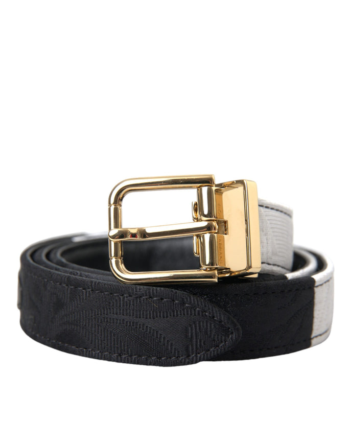 a black and white belt with a gold buckle