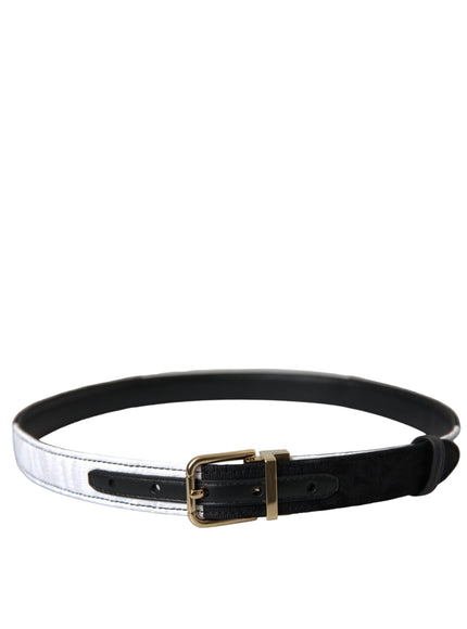 a black and white belt with a gold buckle