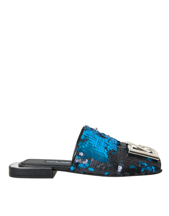 a women's blue and black slipper with sequins