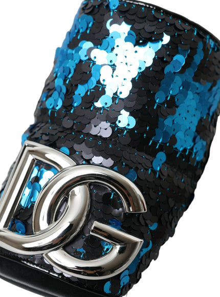 a blue and black sequinized belt with a silver g buckle