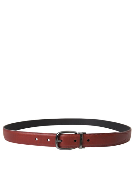 a belt with a metal buckle on a white background