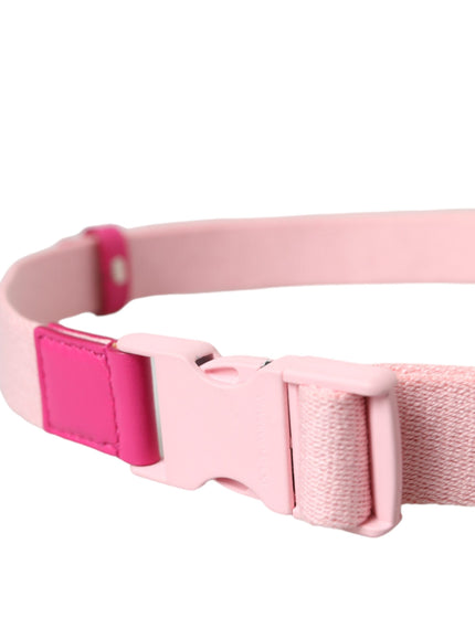 a pink belt with a pink buckle on it