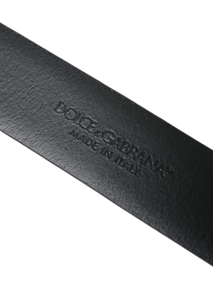 a close up of a knife blade on a white surface