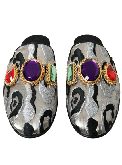 a pair of shoes with a colorful jewel