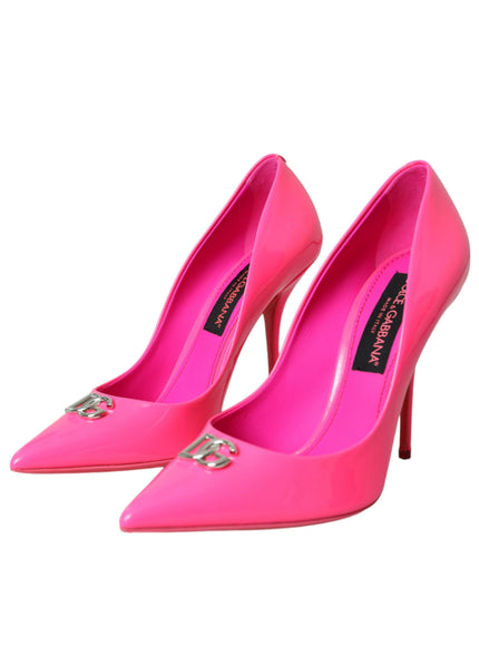 a pair of pink high heels on a white background