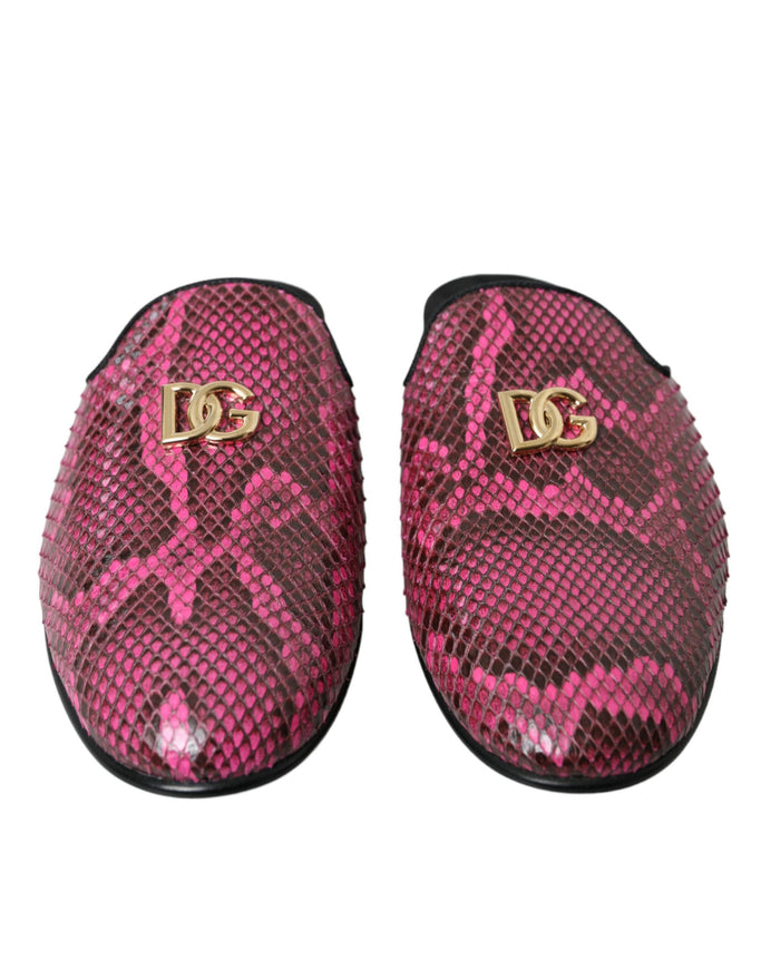 a pair of slippers with a pink snake skin pattern