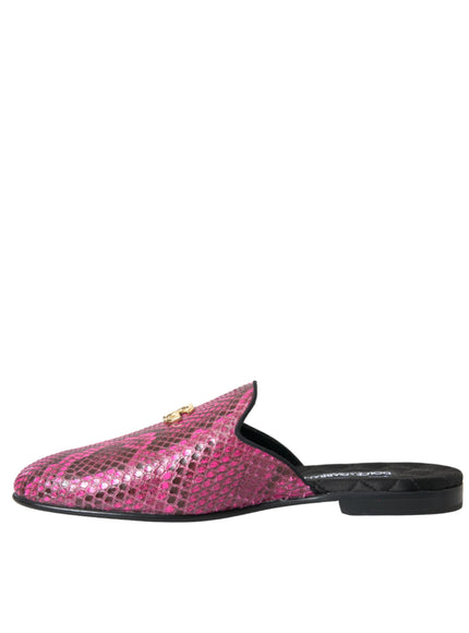 a woman's slipper with a pink snake skin pattern