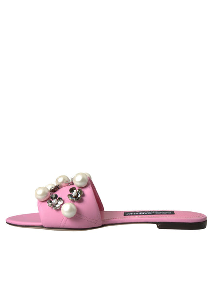 a pair of pink sandals with pearls and pearls