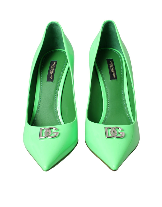 a pair of green high heels with the number 103 on them