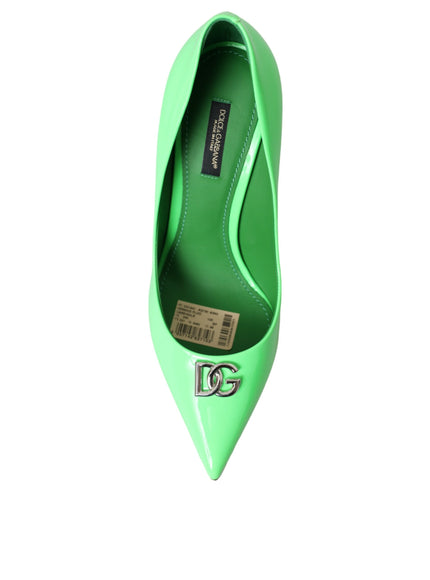 a pair of green shoes on a white background