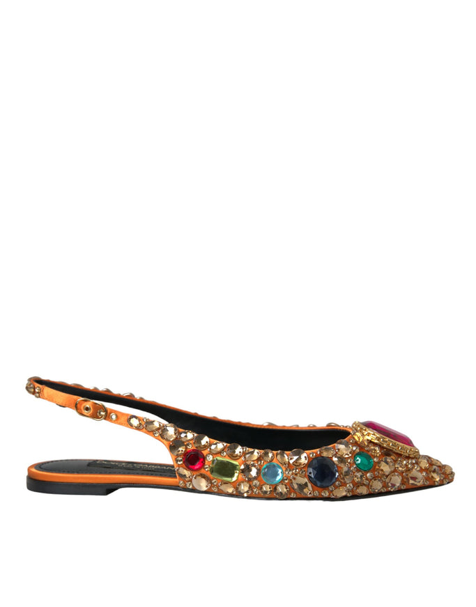 a pair of shoes with jeweled details on them