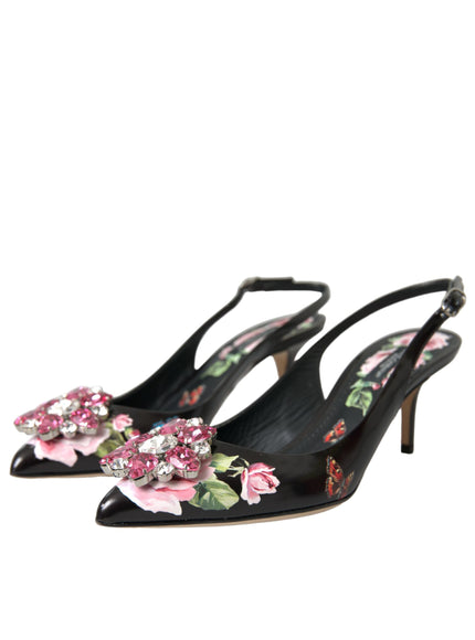 a pair of black high heels with flowers on them