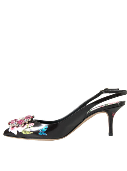 a pair of black shoes with flowers on them