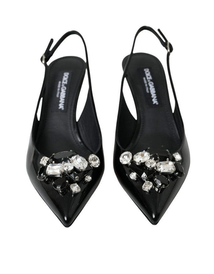 a pair of black high heels with crystal stones