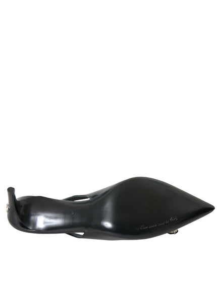 a close up of a black shoe on a white background