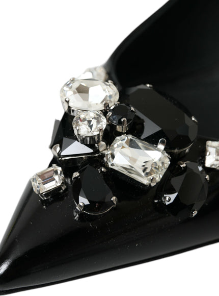 a pair of black high heels with crystal stones