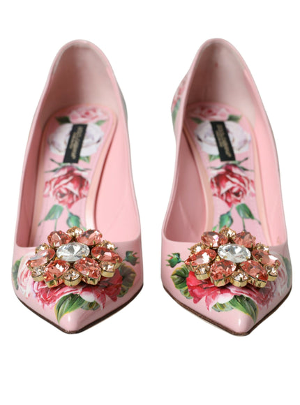 a pair of pink shoes with flowers on them