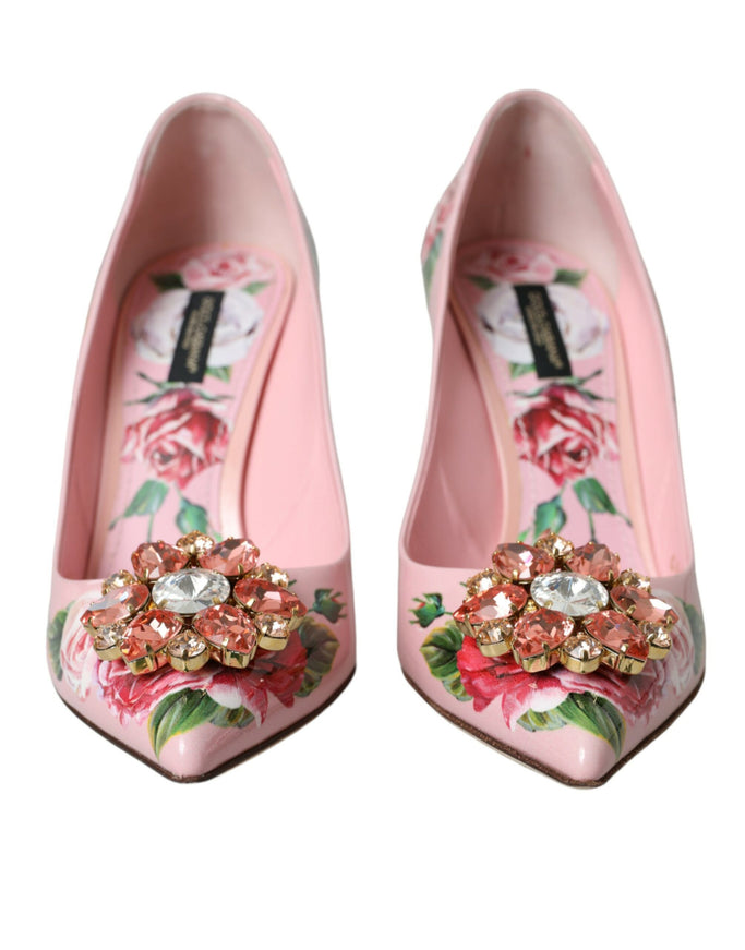 a pair of pink shoes with flowers on them