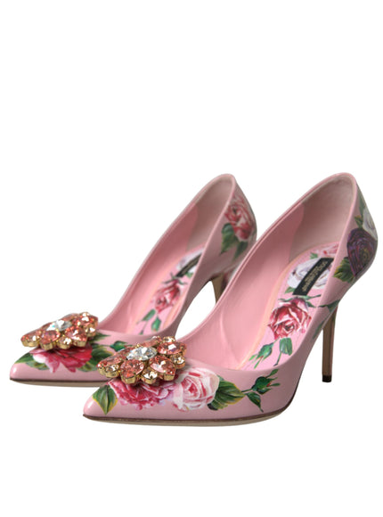 a pair of pink high heels with flowers on them